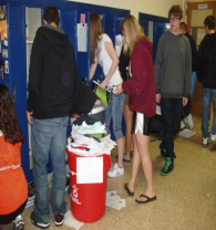 Students recycling the contents of the lockers during the "Biggest Loser" locker cleanout